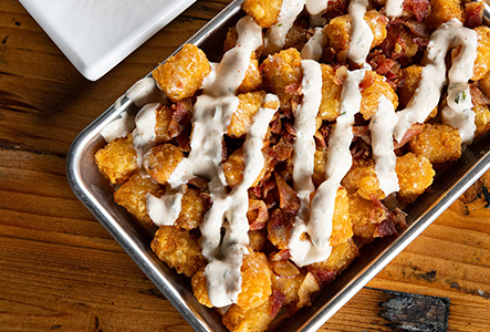 Crispy fried bites topped with sauce